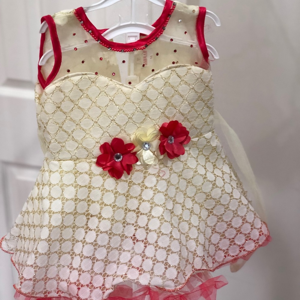Off white baby dress .
